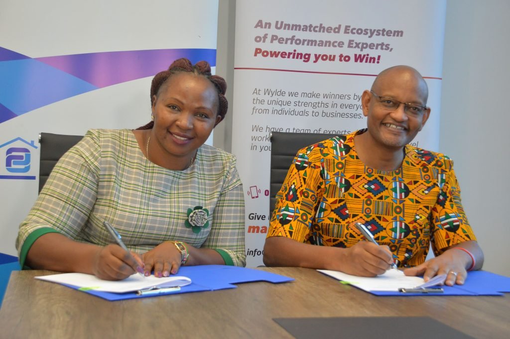 Family Bank Chief Retail Officer Phyllis Kimani & Wylde International Director Kiriinya Kithinji during the MOU signing of a partnership that will see them empower the Bank’s SMEs through capacity-building trainings.